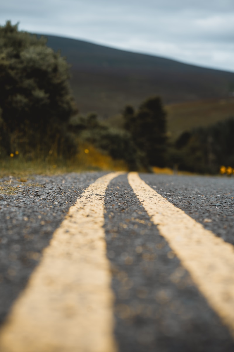 An empty road with two white lines painted on it